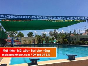 Lắp đặt mái bạt xếp lượn sóng che nắng mưa cho hồ bơi